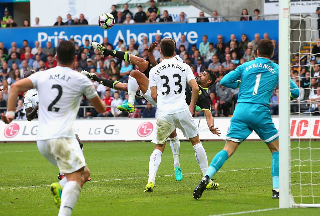 SWANSEA, WALES - SEPTEMBER 11: Diego Costa of Chelsea (2R) scores their second goal during the Premier League match between Swansea City and Chelsea at Liberty Stadium on September 11, 2016 in Swansea, Wales. (Photo by Alex Livesey/Getty Images)