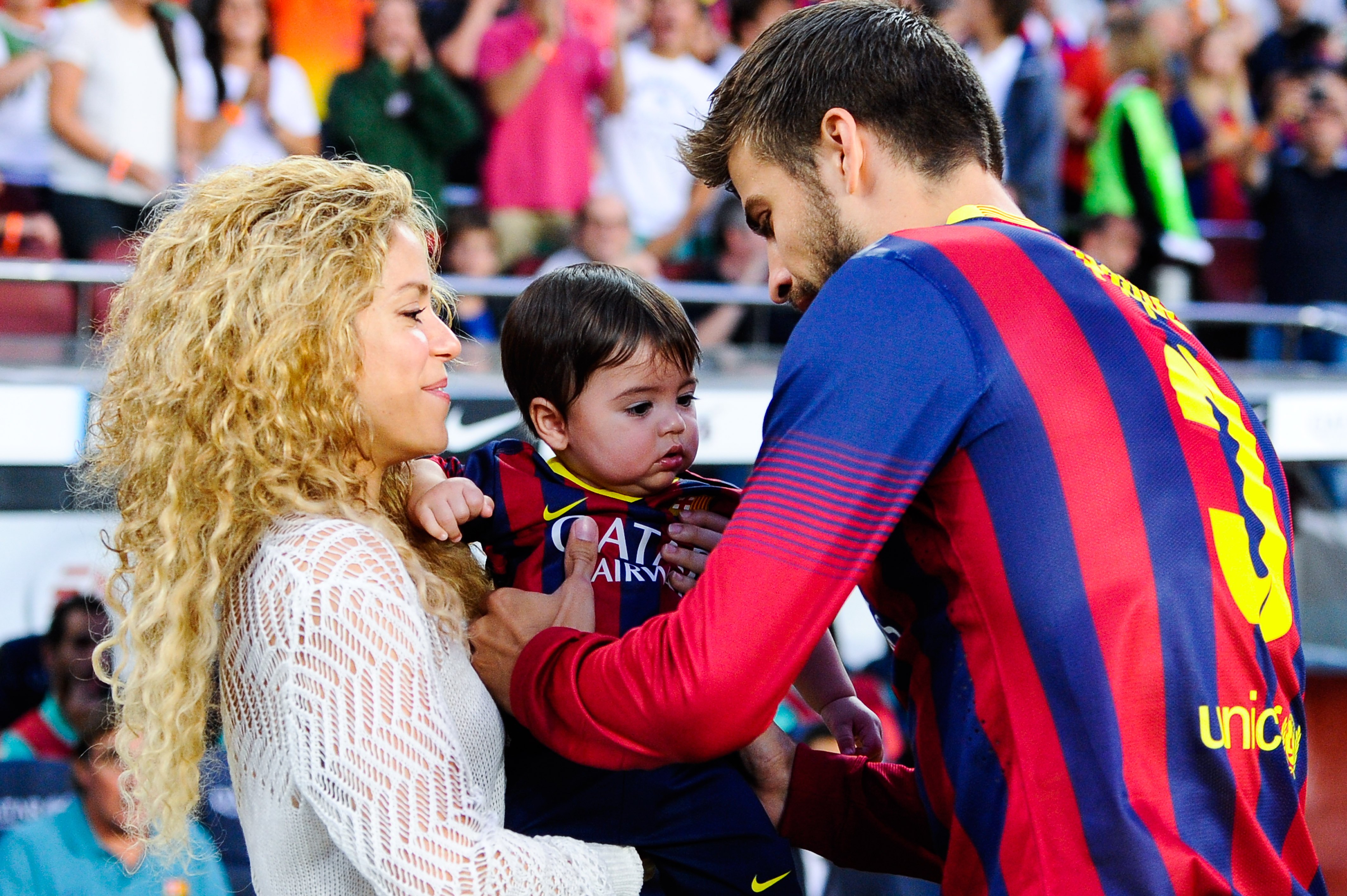 BARCELONA, SPAIN - SEPTEMBER 14: Shakira and Gerard Pique of FC Barcelona are seen with their son Milan prior to the La Liga match between FC Barcelona and Sevilla FC at Camp Nou on September 14, 2013 in Barcelona, Spain. (Photo by David Ramos/Getty Images)