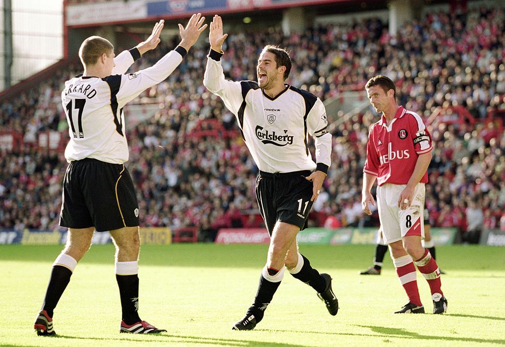 27 Oct 2001: Jamie Redknapp of Liverpool celebrates his goal with team mate Steven Gerrard during the FA Barclaycard Premiership match between Charlton Athletic and Liverpool at the Valley in London. Liverpool won 2-0. Mandatory Credit: Ben Radford /Allsport