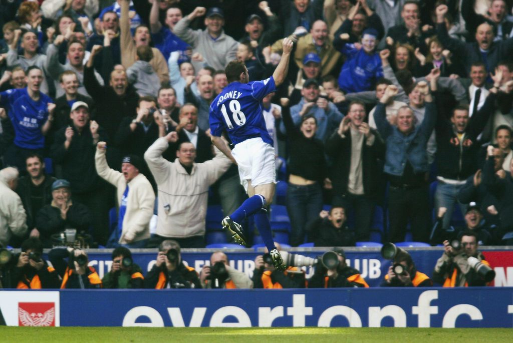 LIVERPOOL - APRIL 6: Wayne Rooney of Everton celebrates scoring the first goal during the FA Barclaycard Premiership match between Everton and Newcastle United held on April 6, 2003 at Goodison Park, in Liverpool, England. Everton won the match 2-1. (Photo by Michael Steele/Getty Images)