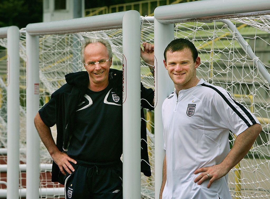 BADEN-BADEN, GERMANY - JUNE 28: Sven Goran Eriksson, the England Head Coach, poses with Wayne Rooney of England after the team's training session at the England World Cup base on June 28, 2006 in Baden-Baden, Germany. (Photo by Adrian Dennis-Pool/Getty Images)