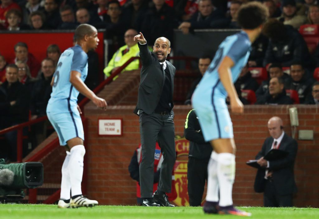 MANCHESTER, ENGLAND - OCTOBER 26: Josep Guardiola, Manager of Manchester City gives his team instructions during the EFL Cup fourth round match between Manchester United and Manchester City at Old Trafford on October 26, 2016 in Manchester, England. (Photo by David Rogers/Getty Images)