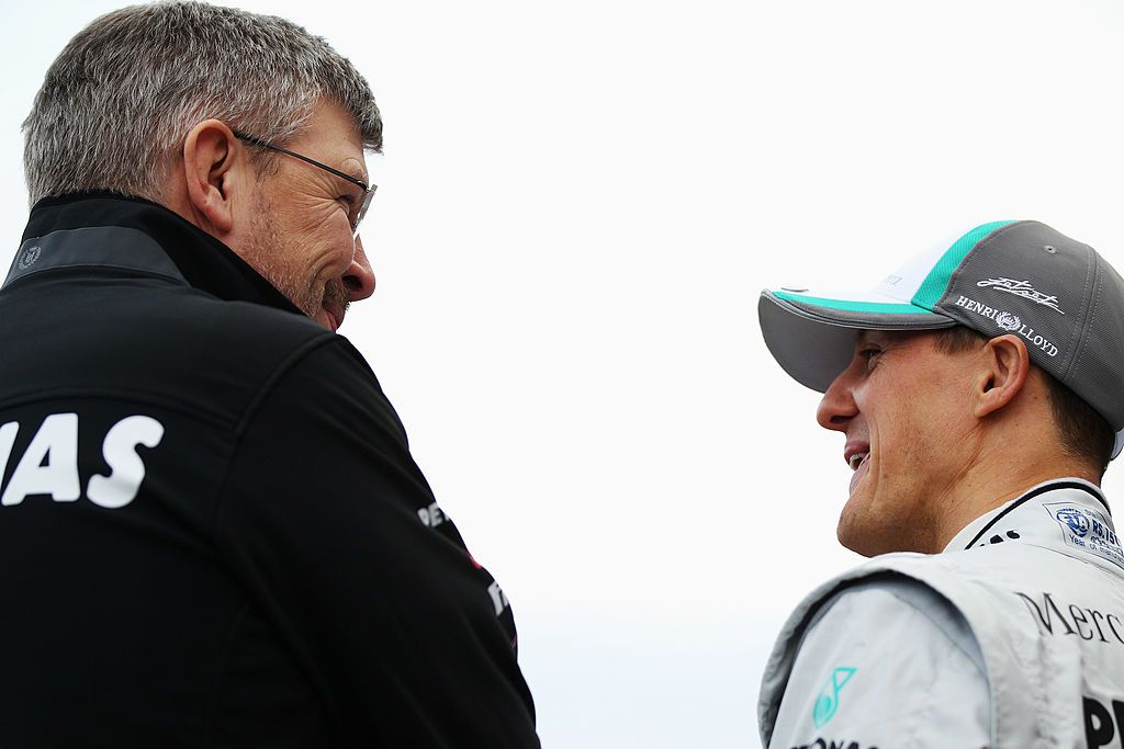 VALENCIA, SPAIN - FEBRUARY 01: Michael Schumacher (R) of Germany and Mercedes GP talks with Mercedes GP Team Principal Ross Brawn (L) as they attend the launch of the new Mercedes MGP W02 at the Ricardo Tormo Circuit on February 1, 2011 in Valencia, Spain. (Photo by Mark Thompson/Getty Images)