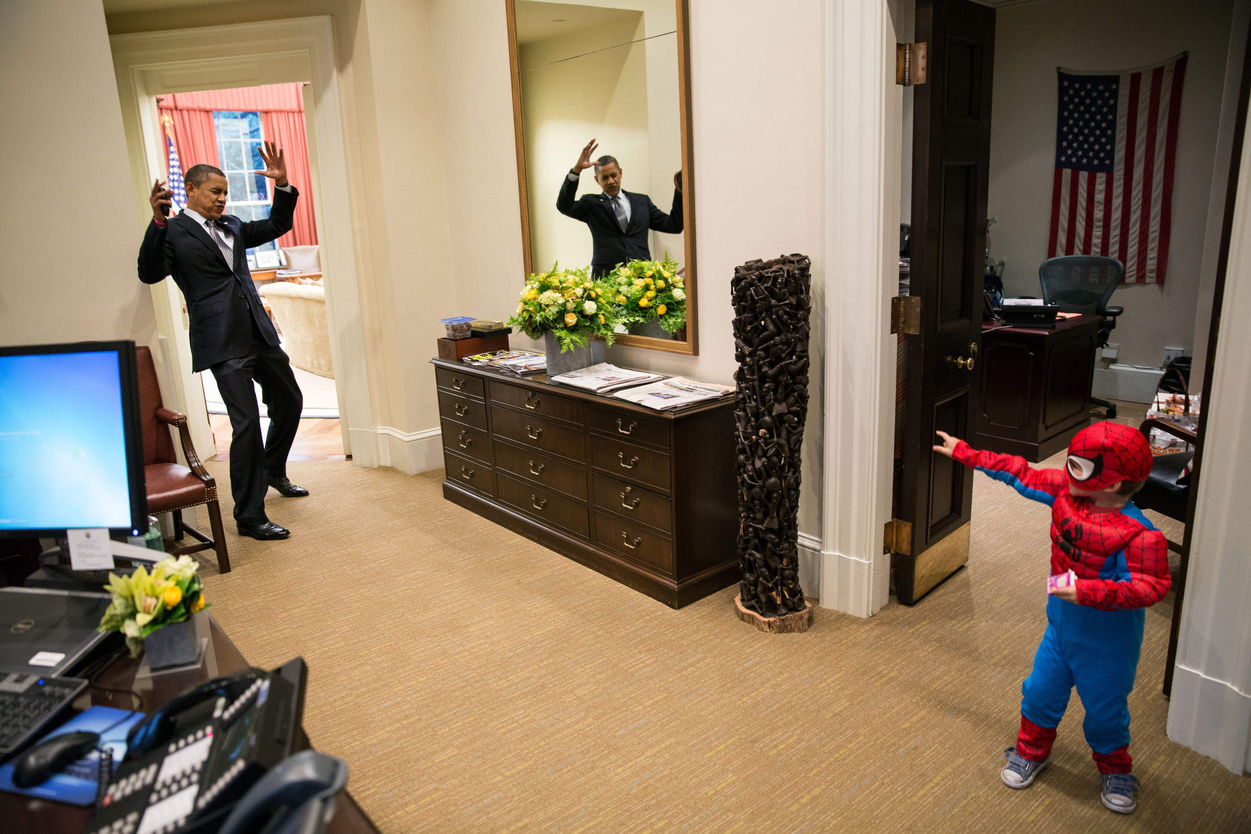 Oct. 26, 2012 "The President to be caught in Spider-Man's web as he greets the Nicholas Tamarin, 3, just outside the Oval Office. Spider-Man had been trick-or-treating for an early Halloween with his father, White House aide Nate Tamarin in the Eisenhower Executive Office Building. I can never commit to calling any picture my favorite, but the President told me that this was HIS favorite picture of the year when he saw it hanging in the West Wing a couple of weeks later." (Official White House Photo by Pete Souza) This official White House photograph is being made available only for publication by news organizations and/or for personal use printing by the subject(s) of the photograph. The photograph may not be manipulated in any way and may not be used in commercial or political materials, advertisements, emails, products, promotions that in any way suggests approval or endorsement of the President, the First Family, or the White House.