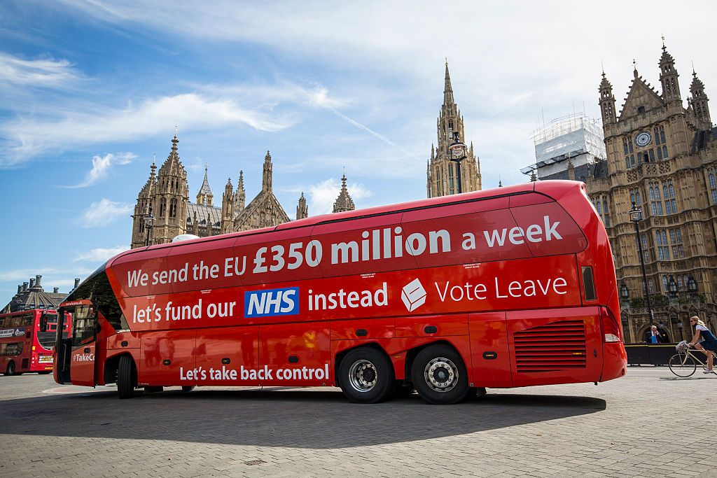 LONDON, ENGLAND - JULY 18: A 'Vote LEAVE' battle bus is parked outside the Houses of Parliament in Westminster by the environmental campaign group Greenpeace before being re-branded on July 18, 2016 in London, England. The bus which was used during the European Union (EU) referendum campaign and had the statement "We send the EU £350 million a week let's fund our NHS instead" along the side was today covered with thousands of questions for the new Prime Minister Theresa May and her government about what a 'Brexit' might mean for the environment. (Photo by Jack Taylor/Getty Images)