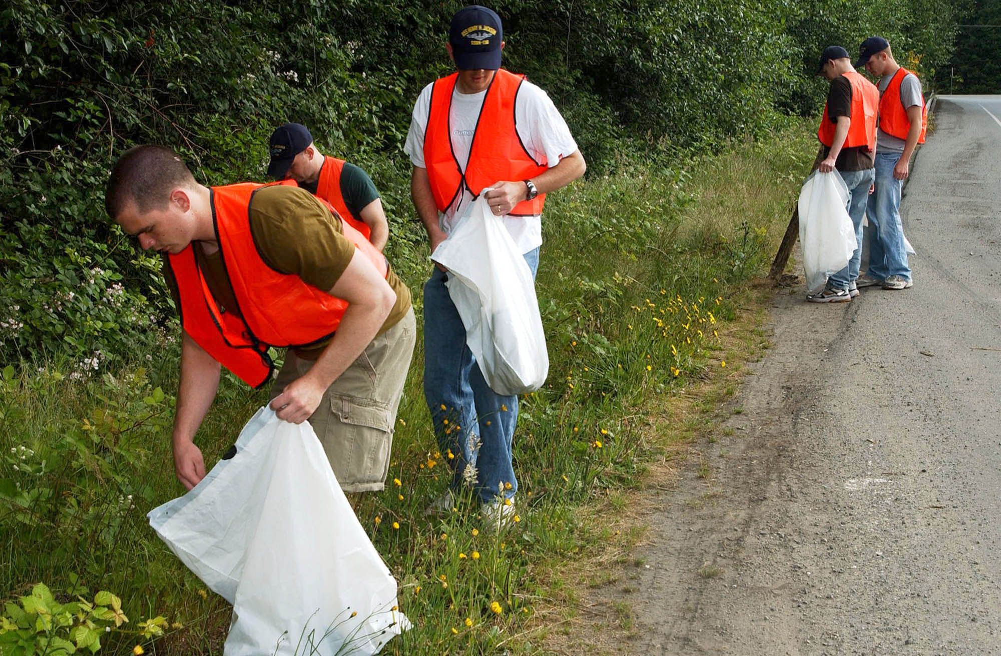 070622-N-2143T-002 POULSBO, Wash. (June 22, 2007) - Sailors assigned to USS Henry Jackson (SSBN 730) pick up litter along Highway 3 as part of WashingtonÕs Adopt-a-Highway program. The Adopt-a-Highway program is an anti-litter and roadside clean-up campaign intended to promote pride and local ownership in Washington State. U.S. Navy photo by Mass Communication Specialist 2nd Class Maebel Tinoko (RELEASED)