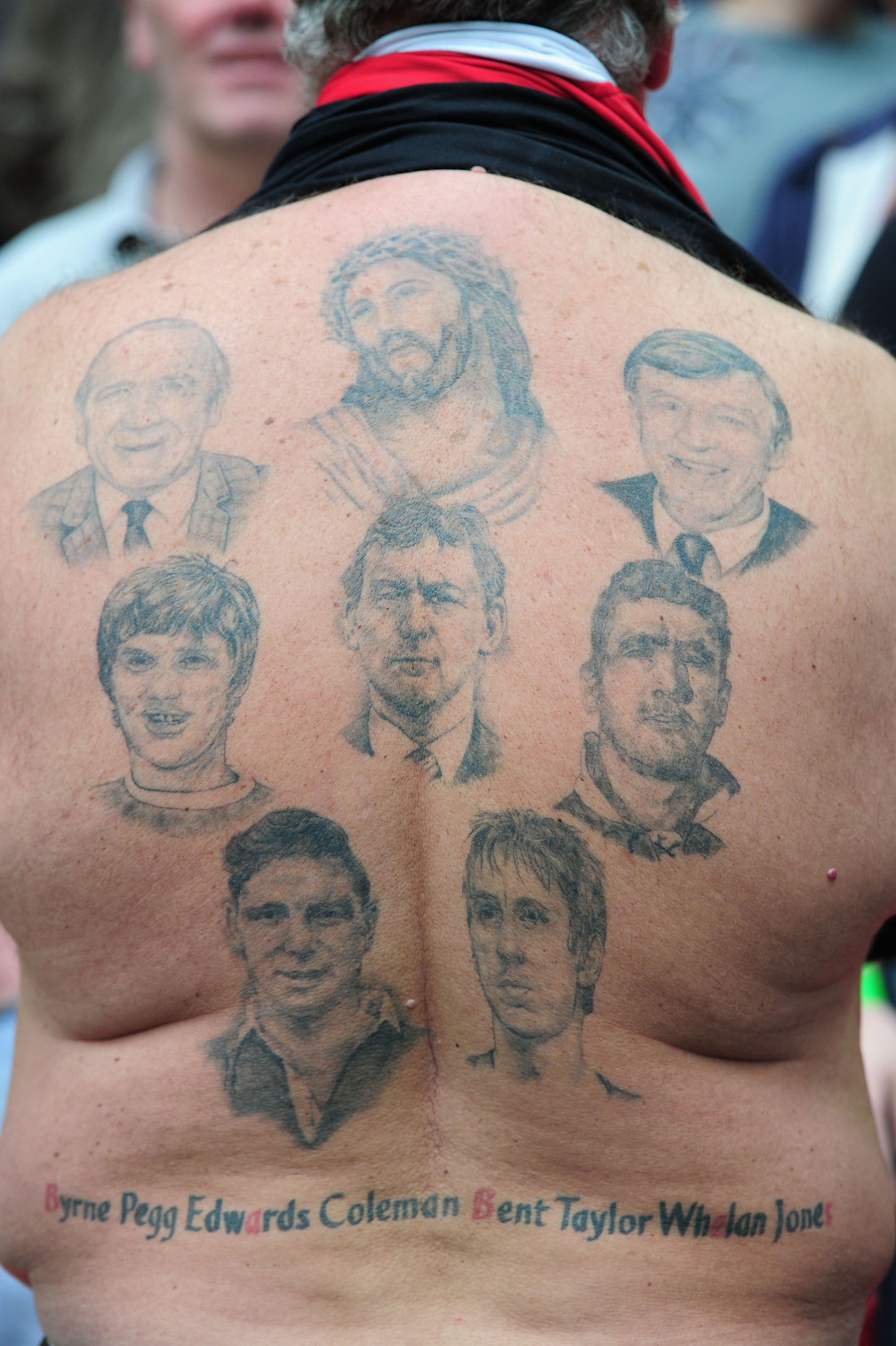 LONDON, ENGLAND - APRIL 16: A Man United fan shows his tattoos of Manchester United 'legends' during the FA Cup sponsored by E.ON semi final match between Manchester City and Manchester United at Wembley Stadium on April 16, 2011 in London, England. (Photo by Jamie McDonald/Getty Images)