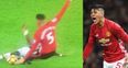 Marcos Rojo somehow escapes red with a lunge that Sergio Aguero would have been proud of