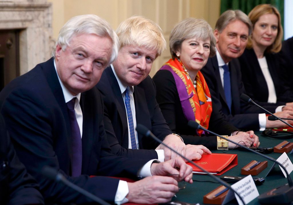 LONDON, ENGLAND - NOVEMBER 28: British Prime Minister Theresa May (3rd L) and (L-R) David Davies Secretary of State for Exiting the European Union, Foreign Secretary Boris Johnson, May, Chancellor of the Exchequer Philip Hammond and Home Secretary Amber Rudd sit opposite a Polish delegation during an intergovernmental consultation meeting in the Cabinet Room in 10 Downing Street on November 28, 2016 in London, England. Mrs Szydlo is expected to discuss a number of issues with Mrs May including the future of Polish citizens after Brexit. (Photo by Peter Nicholls - WPA Pool /Getty Images)