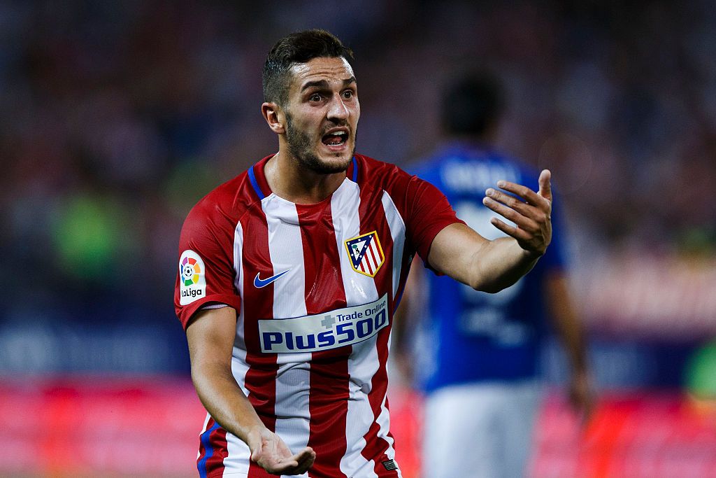 MADRID, SPAIN - AUGUST 21: Koke of Atletico de Madrid protests during the La Liga match between Club Atletico de Madrid and Deportivo Alaves at Vicente Calderon stadium on August 21, 2016 in Madrid, Spain. (Photo by Gonzalo Arroyo Moreno/Getty Images)