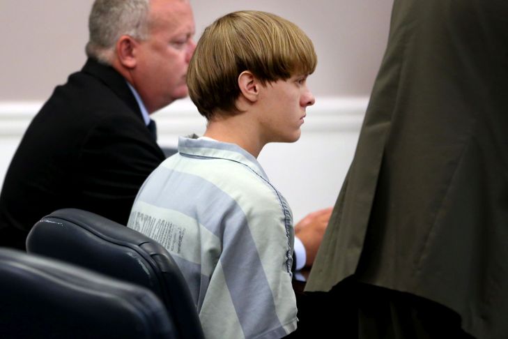 CHARLESTON, SC - JULY 16: Dylan Roof (C), the suspect in the mass shooting that left nine dead in a Charleston church last month, appears in court July 18, 2015 in Charleston, South Carolina. The Associated Press, WCIV-TV and The Post and Courier of Charleston are challenging a judge's order issued last week that prohibits the release of public records in the June 17 shooting at Emanuel African Methodist Episcopal church. (Photo by Grace Beahm-Pool/Getty Images)