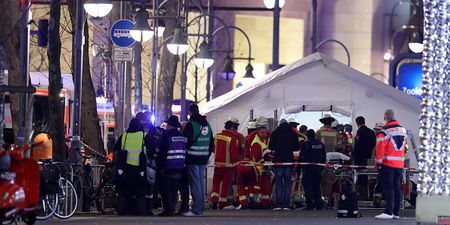 Suspect arrested after a truck crashes into crowds at a Berlin Christmas market