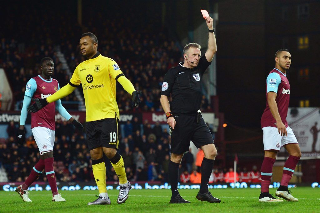 LONDON, ENGLAND - FEBRUARY 02: Jordan Ayew of Aston Villa is shown a red card by referee Jonathan Moss during the Barclays Premier League match between West Ham United and Aston Villa at the Boleyn Ground on February 2, 2016 in London, England. (Photo by Dan Mullan/Getty Images)