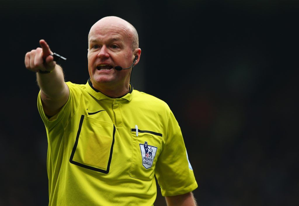 LONDON, ENGLAND - MARCH 14: Referee Lee Mason makes his point during the Barclays Premier League match between Crystal Palace and Queens Park Rangers at Selhurst Park on March 14, 2015 in London, England. (Photo by Matthew Lewis/Getty Images)