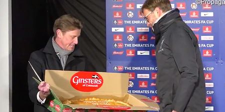 Jurgen Klopp looks utterly bemused as he is presented with giant Ginsters pasty after Cup win