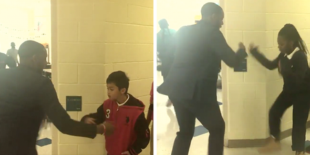 This teacher has a special handshake for each of his students because he’s cooler than you