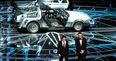 Michael J. Fox got a standing ovation as he hit the Oscars in a DeLorean with Seth Rogen