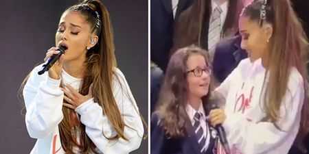 Lovely moment as Ariana Grande comforts and performs with a young fan on-stage