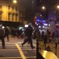 Fireworks and bottles thrown at riot police at Rashan Charles death protest