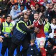 An Arsenal fan was kicked out of Stamford Bridge for running on the pitch to celebrate an offside goal