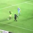 How the hell was this furious fan allowed to stay on the pitch for so long?