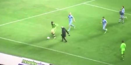 How the hell was this furious fan allowed to stay on the pitch for so long?