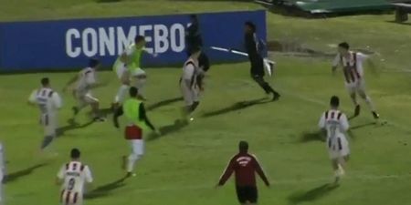 Ecuador player treats corner flag like a spear to avoid being attacked