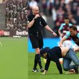 WATCH: Joe Hart has to restrain Mark Noble as he throws pitch invader to the floor