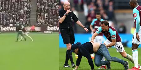 WATCH: Joe Hart has to restrain Mark Noble as he throws pitch invader to the floor