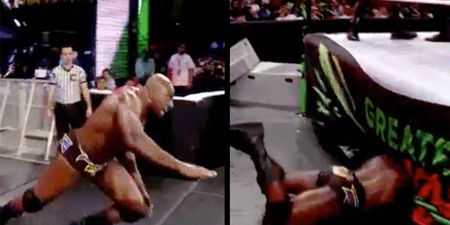 WWE wrestler Titus O’Neil spectacularly faceplants on his way to the ring, ends up underneath it