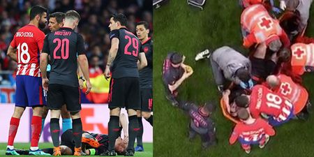 Diego Costa consoles Laurent Koscielny as he’s stretchered off in agony against Atletico Madrid