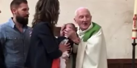 WATCH: Priest loses temper and slaps crying baby during baptismal service
