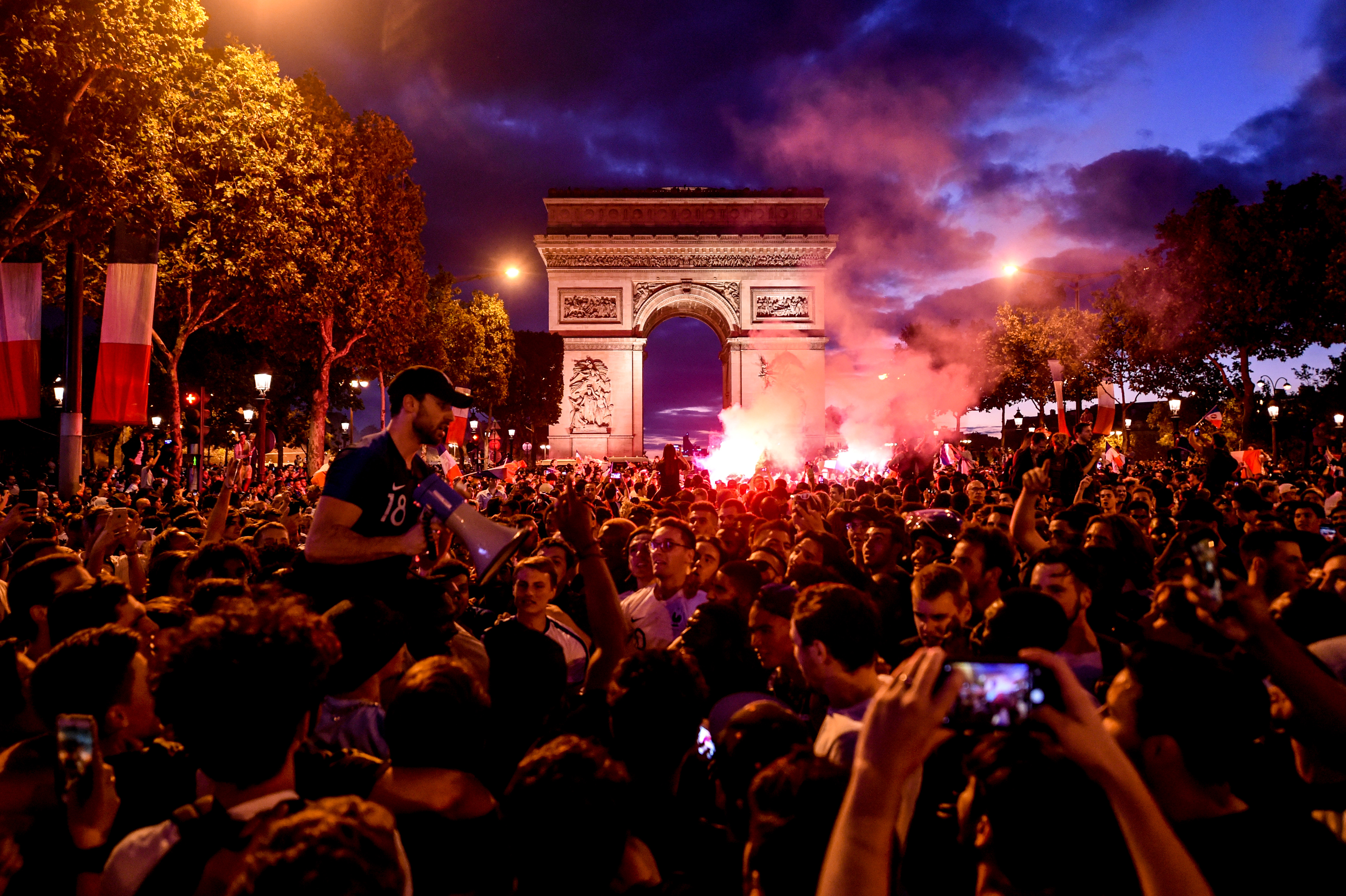PARIS, FRANCE - JULY 10: Ambiance on Les Champs Elysees after the victory of France. Semi final Fifa world cup 2018. July 10, 2018 in Paris, France. (Photo by Anthony Ghnassia/Getty Images)