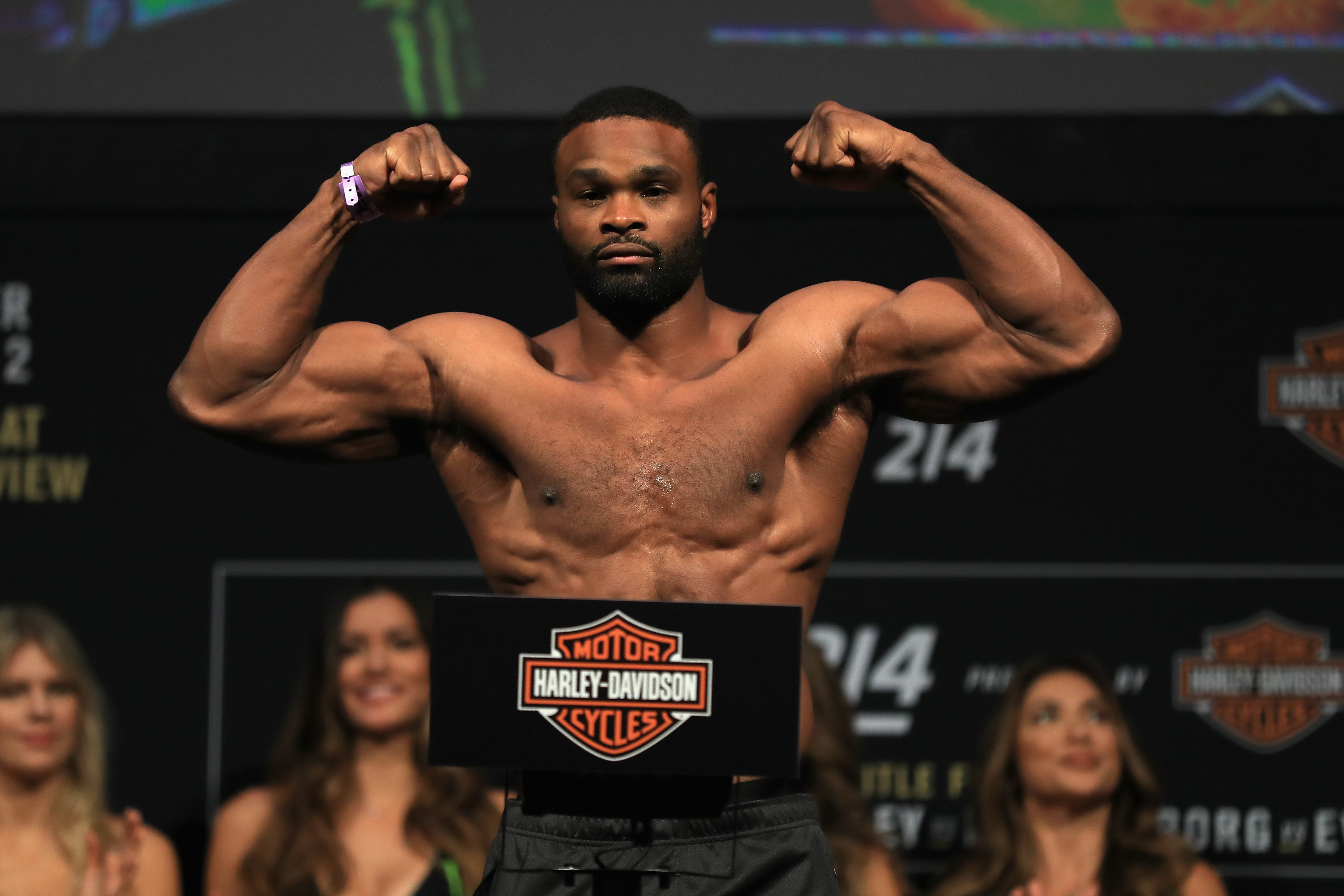ANAHEIM, CA - JULY 28: (L_R) Tyrone Woodley poses on the scale during the UFC 214 weigh-in at Honda Center on July 28, 2017 in Anaheim, California. Woodley will fight Demian Maia in a welterweight title bout on July 28, 2017 in Anaheim, California. (Photo by Sean M. Haffey/Getty Images)
