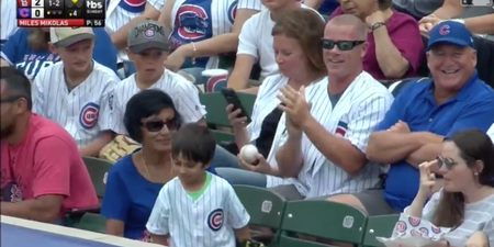 Adult man steals ball from small child at baseball game, but it’s not quite as it seems