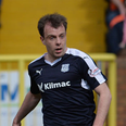Dundee FC footballer pictured playing with electronic tag on his ankle