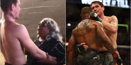 Darren Till embraced by Tyron Woodley’s mother backstage at UFC 228