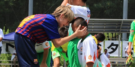 Barcelona youngsters console distraught opposition after tournament win
