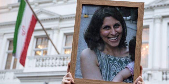 LONDON, ENGLAND - JANUARY 16: Supporters hold a photo of Nazanin Zaghari-Ratcliffe during a vigil for British-Iranian mother, Nazanin Zaghari-Ratcliffe, imprisoned in Tehran outisde the Iranian Embassy on January 16, 2017 in London, England. Charity worker Nazanin Zaghari-Ratcliffe was jailed for five years in September 2016 for allegedly attempting to overthrow the Iranian government. The vigil, being held outside the Iranian Embassy in London marks one year since the Washington Post journalist Jason Rezaian and other US-Iranian dual-nationals were released from prison in Iran. (Photo by Chris J Ratcliffe/Getty Images)