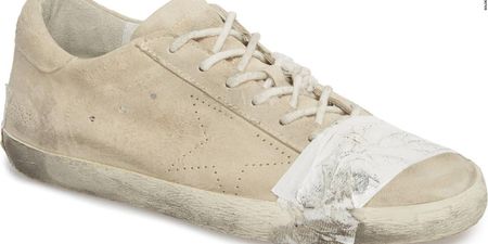 £335 pair of shoes comes with free tape and dog s**t stains