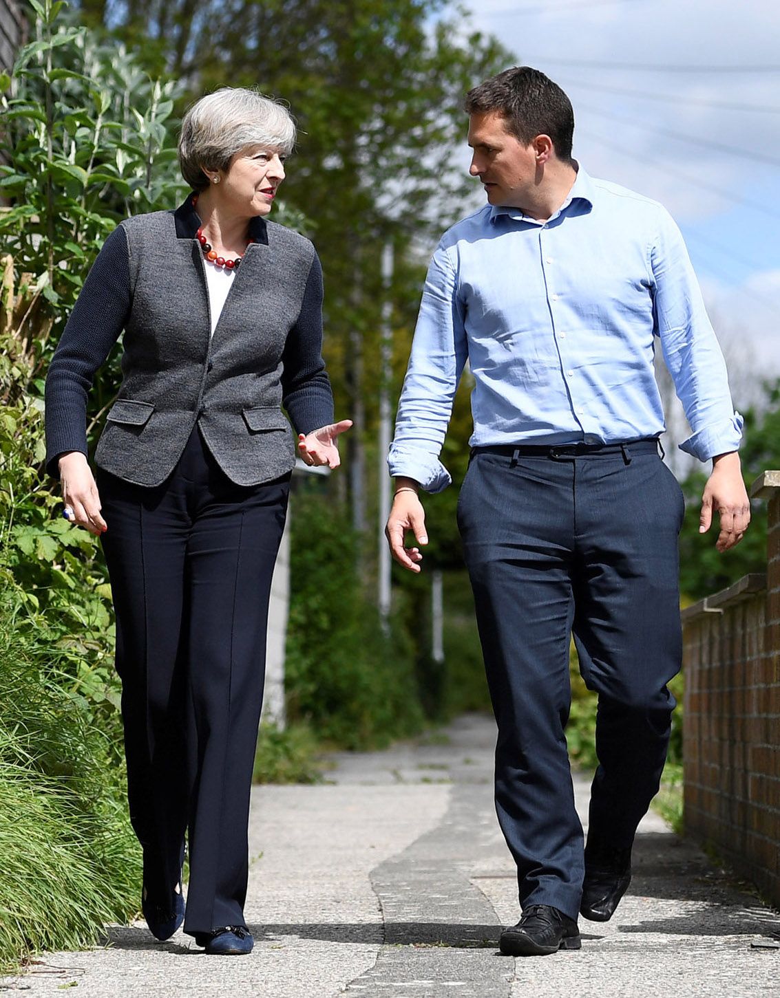 PLYMOUTH, UNITED KINGDOM - MAY 2: Britain's Prime Minister Theresa May walks with local Conservative Party candidate Johnny Mercer during a campaign visit on May 2, 2017 in Plymouth, England. The Prime Minister is campaigning in South-West England, a former Liberal Democrat stronghold, as she urges West Country voters to stick with her party ahead of the polls on June 8. (Photo by Dylan Martinez/WPA Pool/Getty Images)