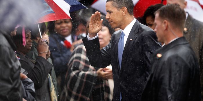 ARLINGTON, VA - SEPTEMBER 11: In the driving rain, U.S. President Barack Obama salutes to family members of victims of the 9/11 attack during a rememberance ceremony at the Pentagon September 11, 2009 in Arlington, Virginia. Obama joined staff and family members at the Pentagon to comemorate the eighth anniversary of the September 11 attacks. (Photo by Chip Somodevilla/Getty Images)
