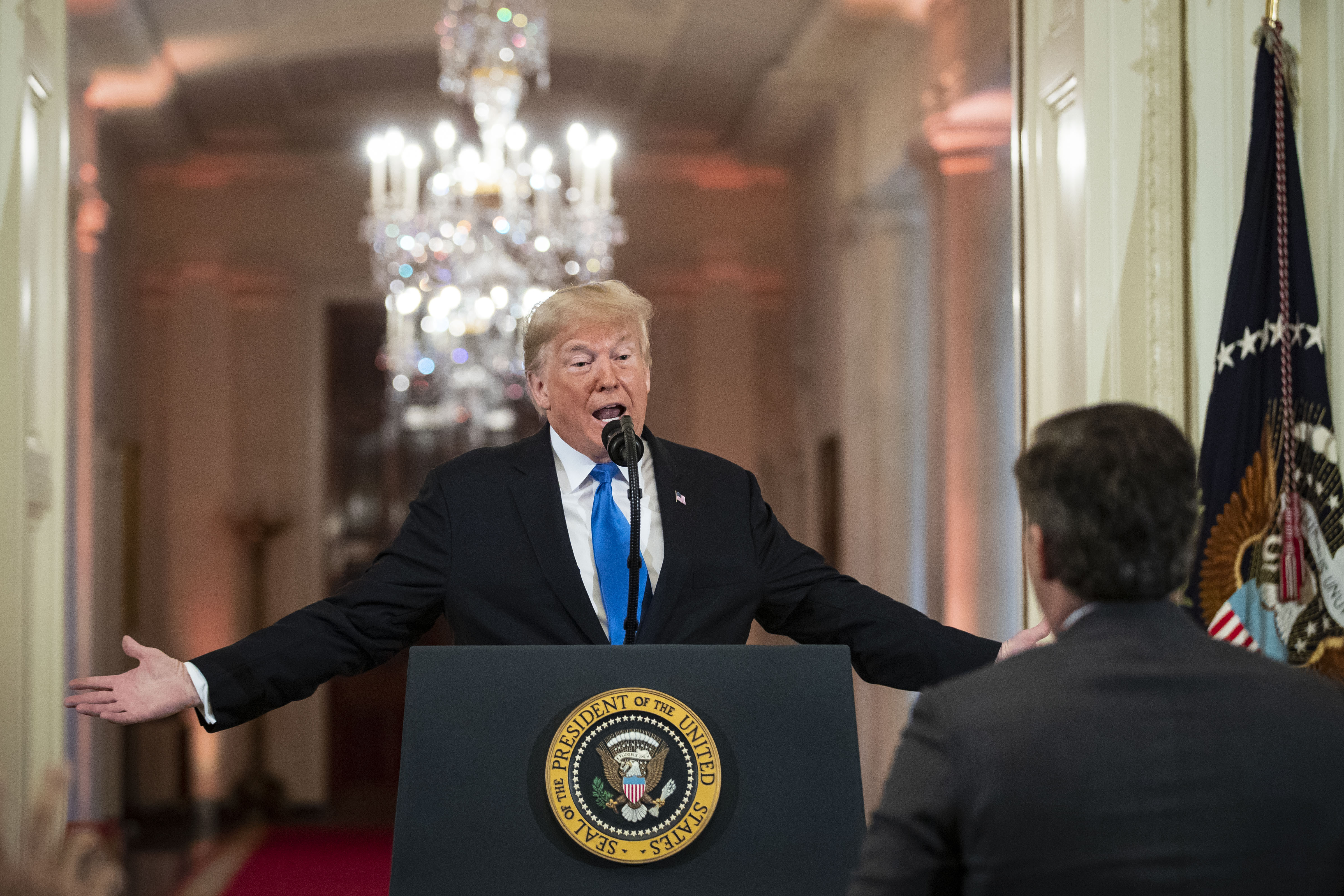 WASHINGTON, DC - NOVEMBER 07: (AFP OUT) U.S. President Donald Trump gets into an exchange with CNN reporter Jim Acosta during a news conference a day after the midterm elections on November 7, 2018 in the East Room of the White House in Washington, DC. Republicans kept the Senate majority but lost control of the House to the Democrats. (Photo by Al Drago - Pool/Getty Images)