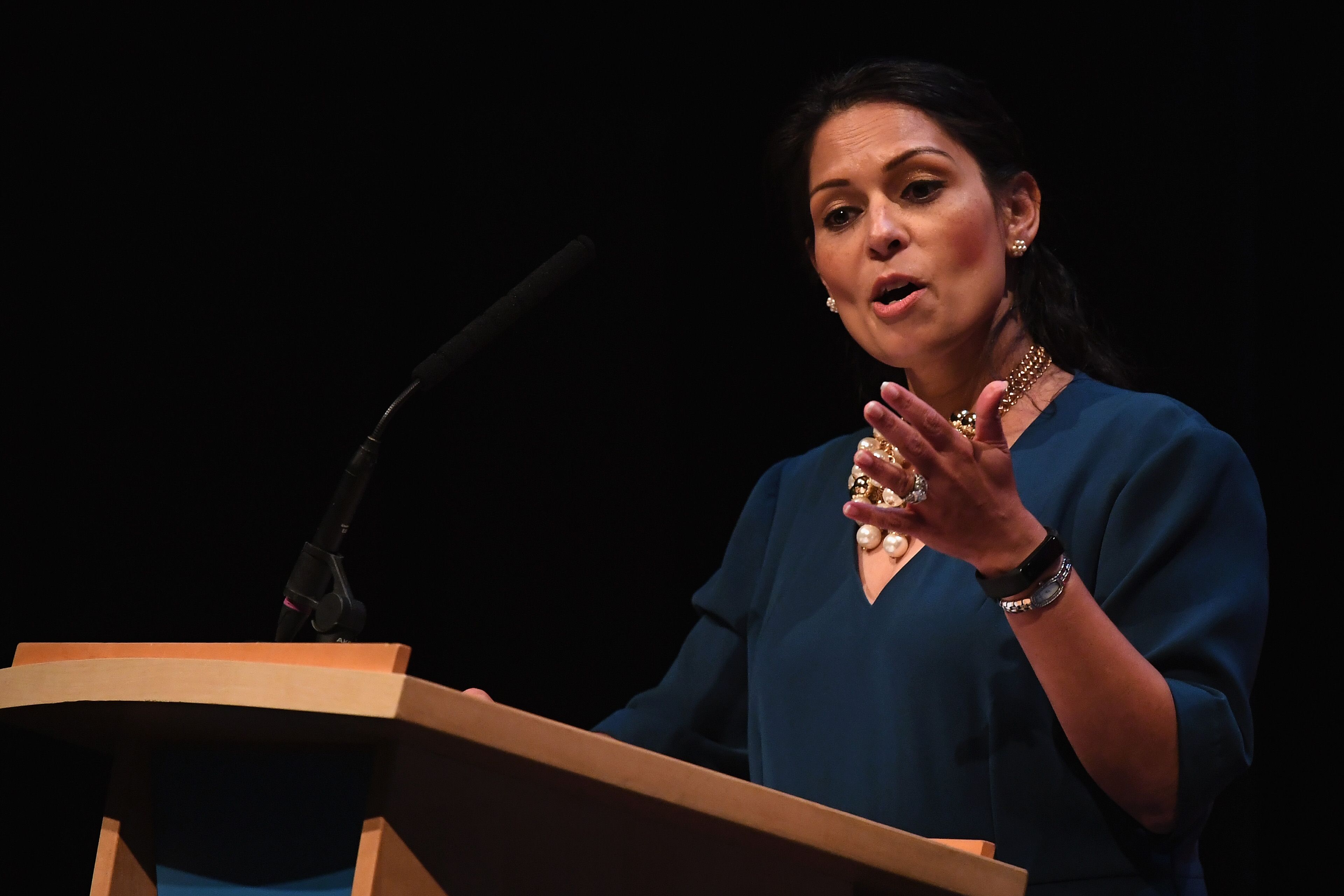 BIRMINGHAM, ENGLAND - SEPTEMBER 30: Secretary of State for International Development Priti Patel speaks during the annual Conservative Party Conference on September 30, 2018 in Birmingham, England. The Conservative Party Conference 2018 is taking place at Birmingham's International Convention Centre (ICC) from September 30 to October 3. (Photo by Jeff J Mitchell/Getty Images)
