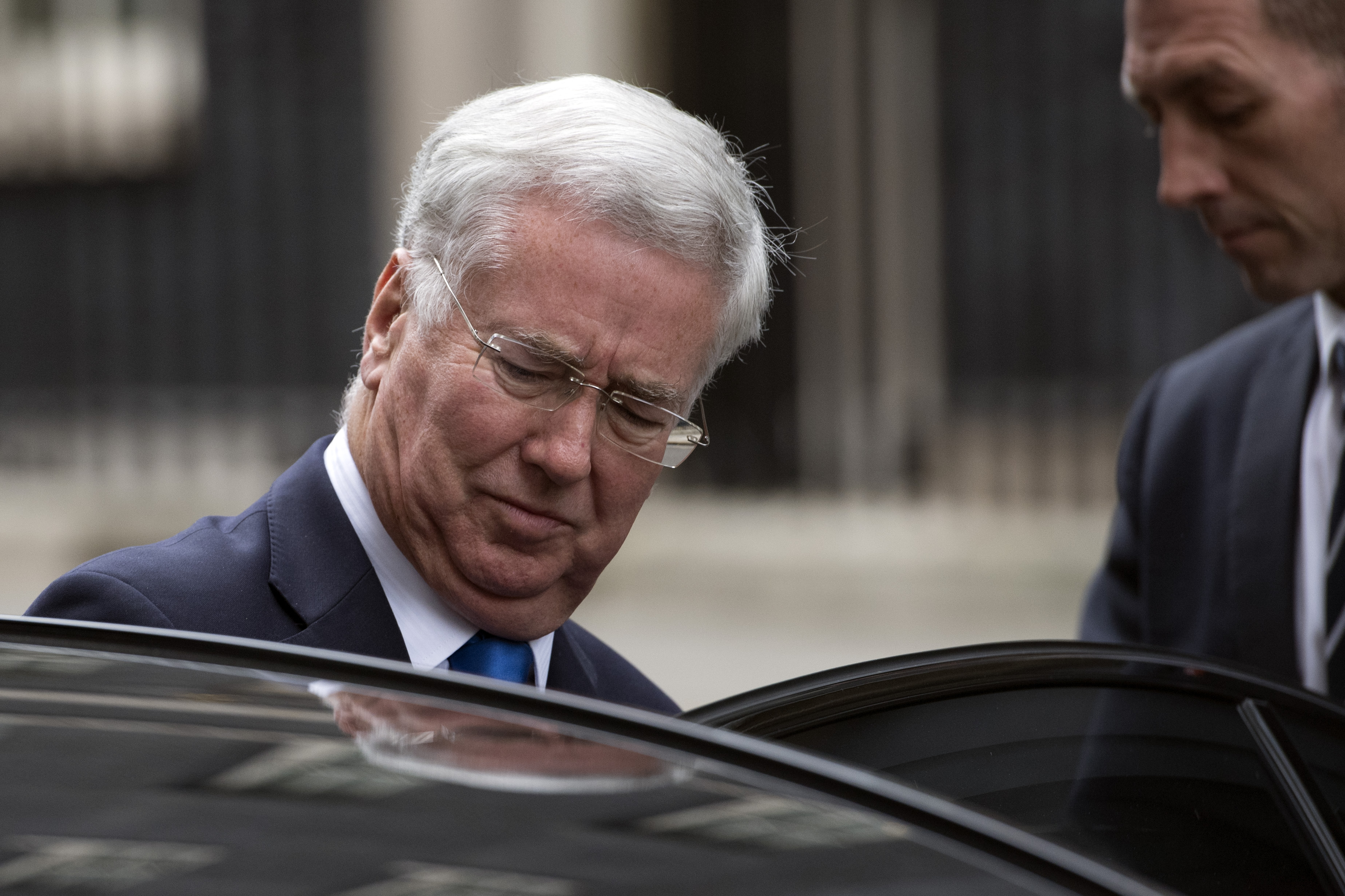 LONDON, ENGLAND - OCTOBER 31: Defence secretary Michael Fallon leaves after attending a cabinet meeting in Downing Street on October 31, 2017 in London, England. The Prime Minister is expected to discuss claims of sexual misconduct amongst members of parliament and Commons staff. (Photo by Carl Court/Getty Images)