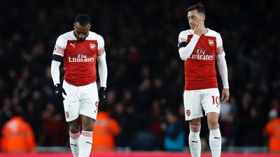 Mesut Özil misses out on north London derby with ‘back injury’