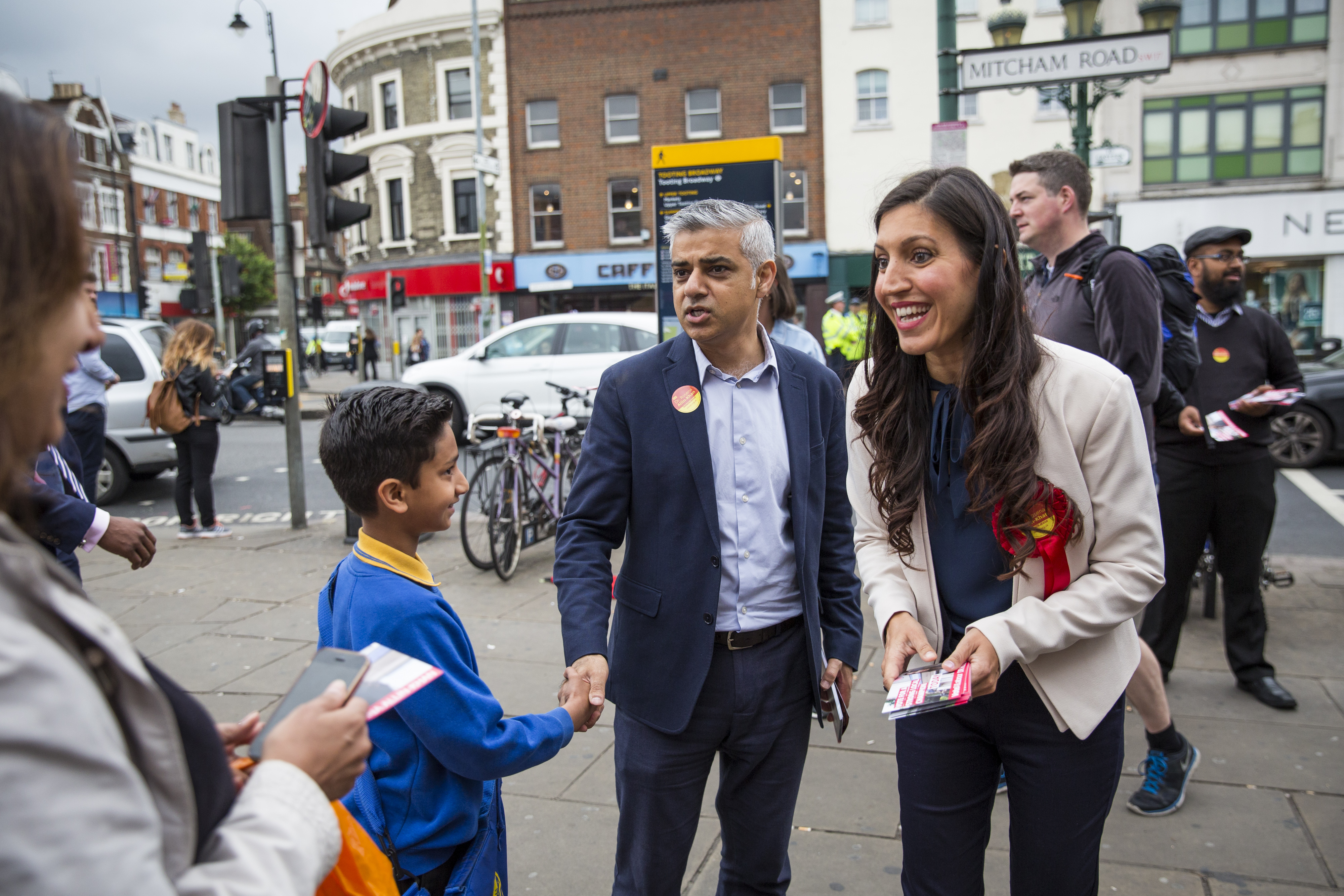LONDON, ENGLAND - JUNE 16: Labour's MP candidate for Tooting Dr Rosena Allin-Khan (R) campaigns with London Mayor Sadiq Khan (C) outside Tooting Broadway Station on June 16, 2016 in London, England. Voters in Tooting, south London decide on a new MP in a by-election today following the seat vacancy left from Sadiq Khan's mayoral victory last month. (Photo by Jack Taylor/Getty Images)
