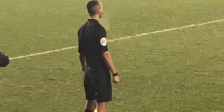 League Two assistant referee runs the line in smart shoes