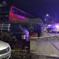 Double-decker bus smashes into garden of London home causing Boxing Day chaos