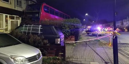 Double-decker bus smashes into garden of London home causing Boxing Day chaos